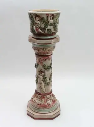 An impressive polychrome Capo Di Monte jardinière and stand