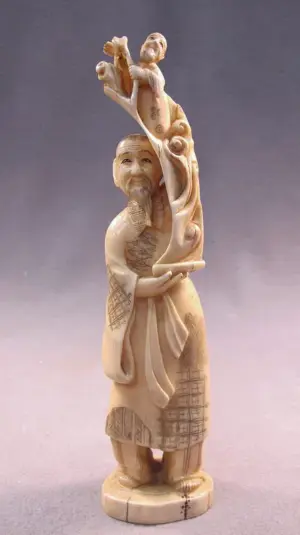 Japanese carved ivory group statue