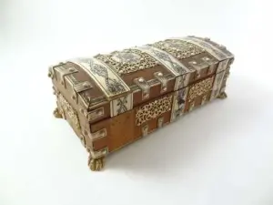 An Indian semi-domed sandlewood and ivory (with openwor