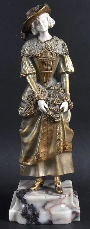 R. MARQUET A SUPERB GILT BRONZE AND IVORY FIGURE OF A