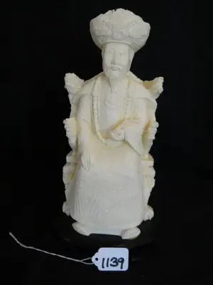 IVORY EMPEROR SITTING - BLACK WOOD STAND - 12''