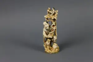 Chinese Signed Ivory carved figure with dragon