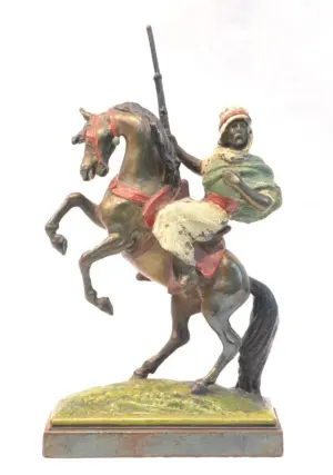 SIGNED PAUL HERZEL BRONZE MAN WITH GUN ON HORSE