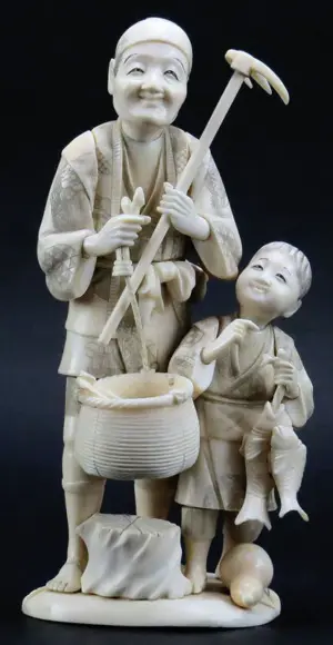 Large Japanese Carved Ivory Group Man with Hoe and