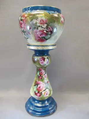 Old ceramic planter with pedestal