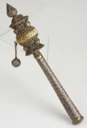 Tibetan silvered metal prayer wheel