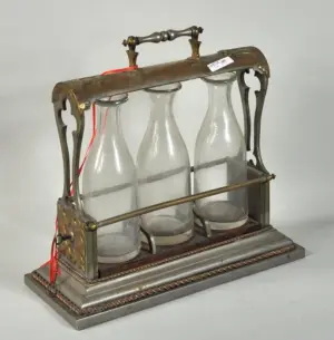 Metal and Engraved Brass Tantalus Set