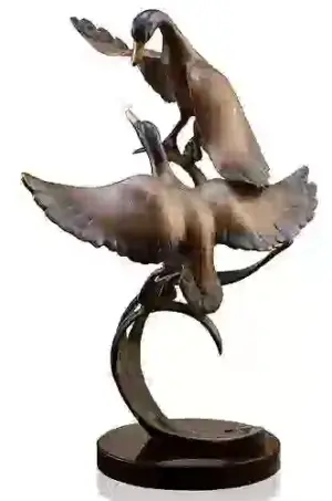 DUCKS TAKING FLIGHT BRONZE SCULPTURE