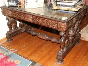 CARVED OAK LIBRARY TABLE, EARLY 20TH C.