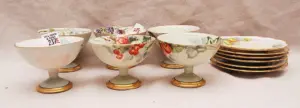 6 hand painted handless pedestal cups & saucers