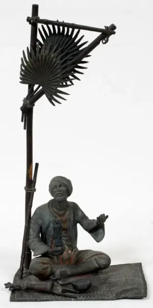 SPELTER FIGURAL LAMP, MANNER OF FRANZ BERGMAN