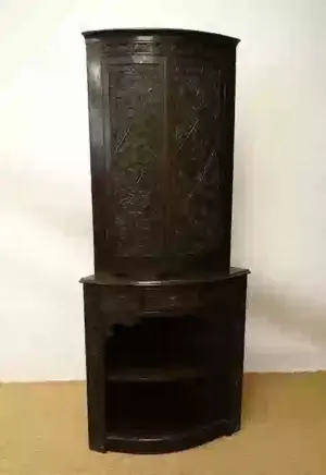 A Late Victorian bow front floor standing corner