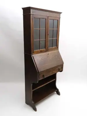 An early 20thC oak Students bureau Bookcase 67" high x