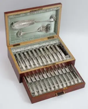 A cased canteen of silver plate and mother of pearl