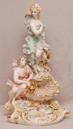 Bisque/ceramic double maiden with shell centerpie