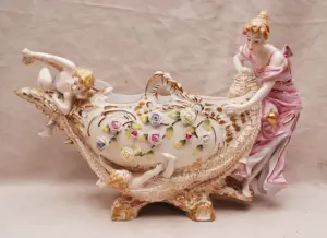 Centerpiece oval bowl with maiden and angels