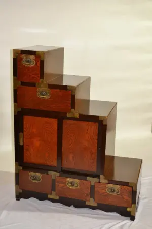 ORIENTAL STEP CHEST WITH BRASS MOUNTS HAS