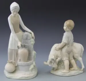 TWO PORCELAIN NAO LLADRO FIGURES BOY AND GIRL