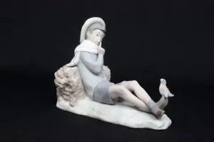 Lladro "Pensive Boy with Bluebird"