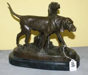 Bronze figural group of dogs on a marble base and