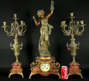 Three Piece Patinated Spelter and Rouge Marble Clock